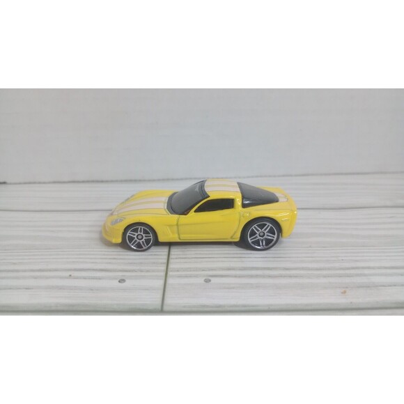 Hot Wheels Chevrolet Corvette C6, Yellow with White Stripes, 1:64; Loose - Picture 2 of 7